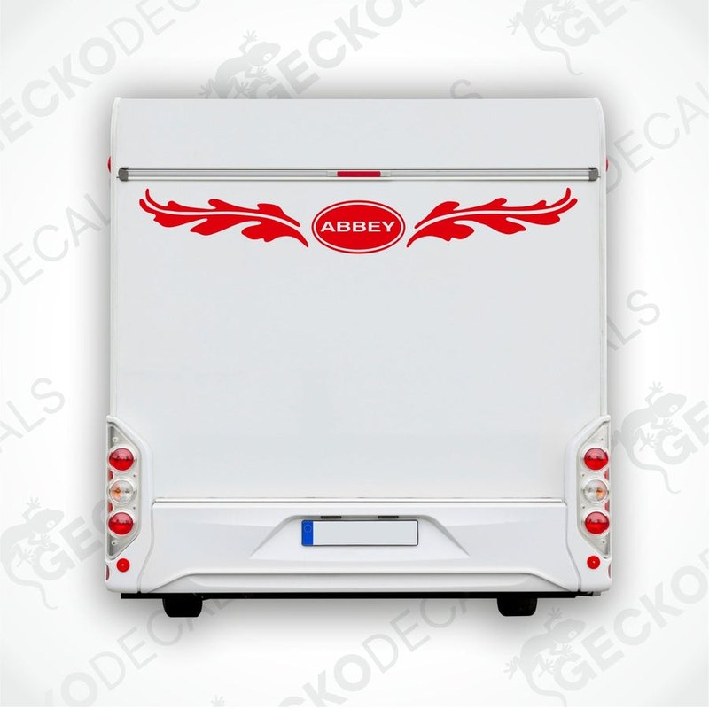 Red ABBEY caravan rear decal with leafy wing motifs applied to white trailer