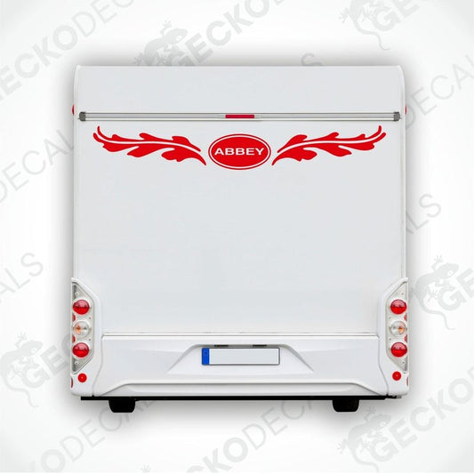 Red ABBEY caravan rear decal with leafy wing motifs applied to white trailer
