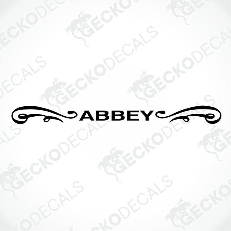 Black die-cut Abbey caravan sticker with symmetrical scroll design on transfer paper