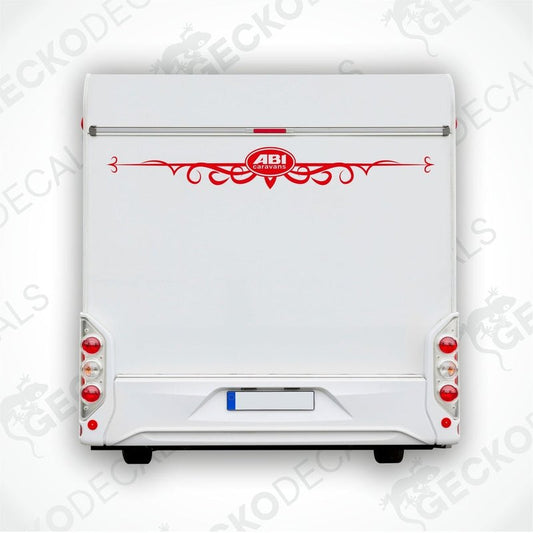 ABI caravan rear decal with ornate scrollwork on white trailer