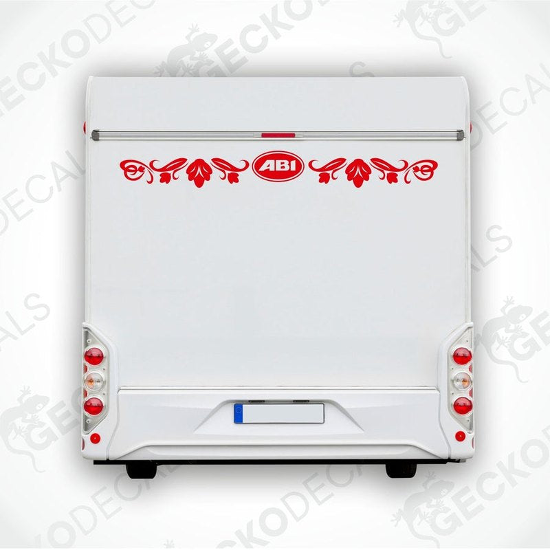 ABI caravan rear decal with red oval logo and black scroll motifs applied to white caravan back