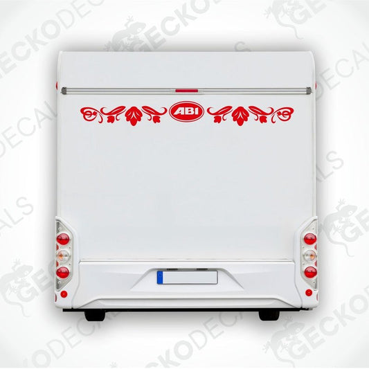 ABI caravan rear decal with red oval logo and black scroll motifs applied to white caravan back