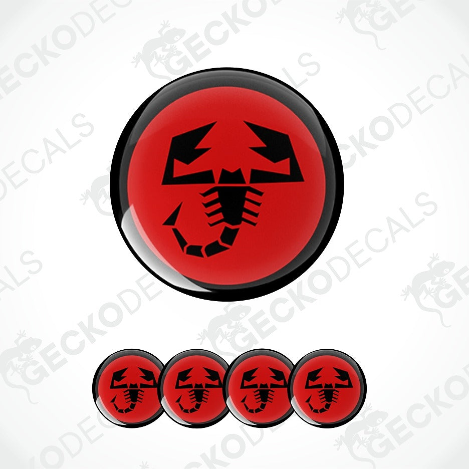 A set of circular red and black scorpion-themed decals, featuring one large decal at the top and four smaller ones aligned horizontally at the bottom, all on a white background with faint watermarks.