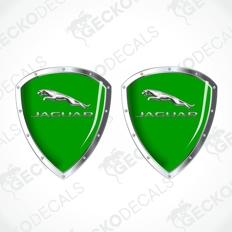 Two green Jaguar shield-shaped decals with silver borders, leaping cat logos, and JAGUAR text on a white background with faint GECKODECAL watermarks.