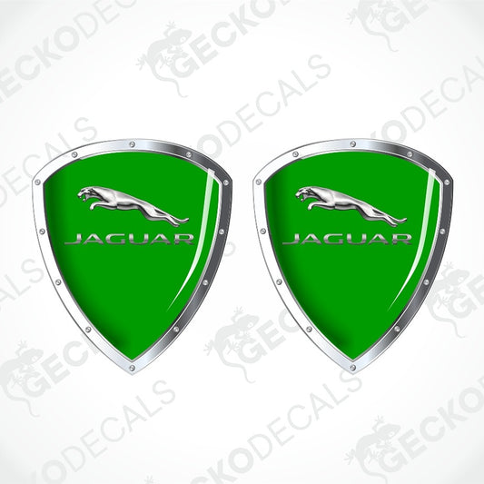 Two green Jaguar shield-shaped decals with silver borders, leaping cat logos, and JAGUAR text on a white background with faint GECKODECAL watermarks.