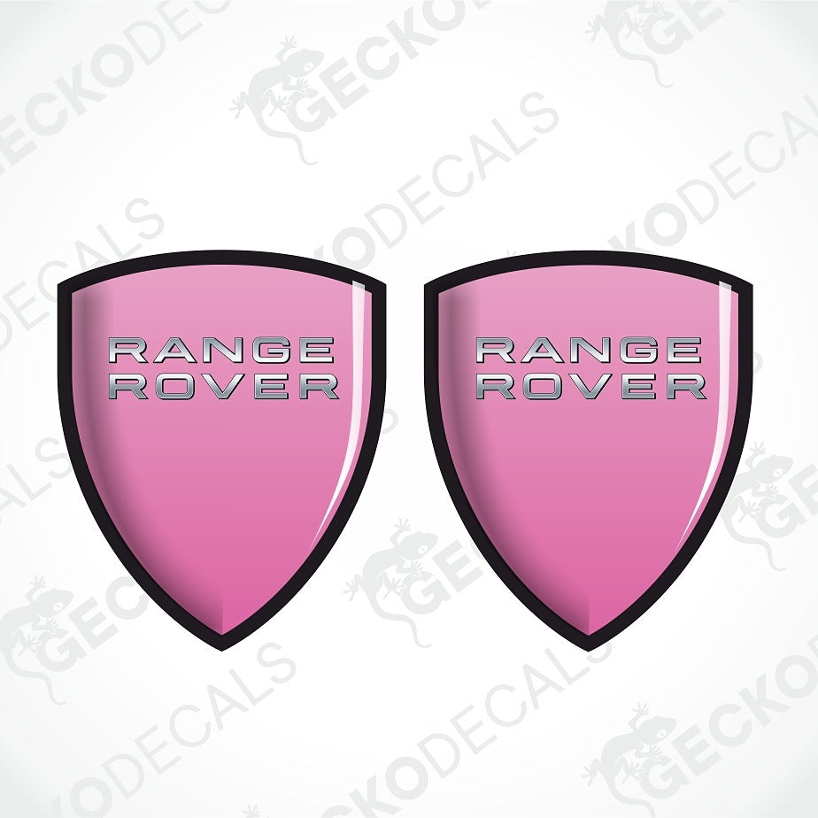 Two pink shield-shaped Range Rover decal stickers with silver lettering and black borders, shown on a white background with a faint watermark pattern.