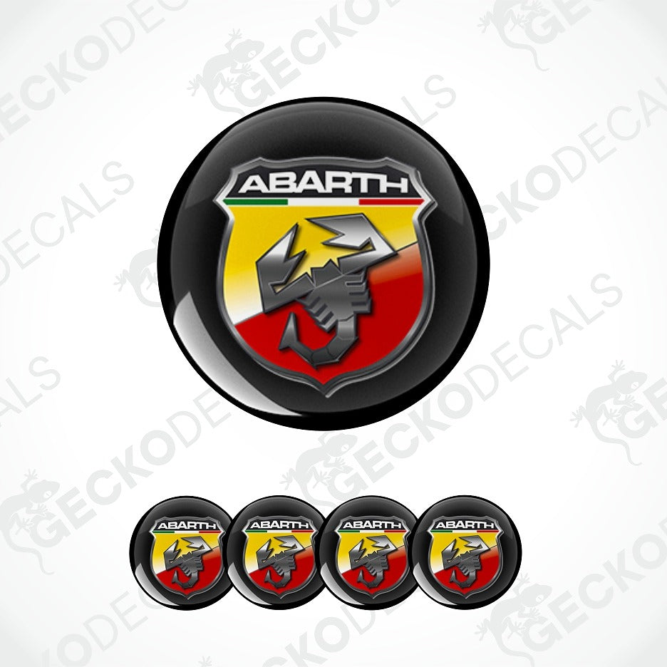 A set of circular Abarth decal stickers, featuring one large glossy emblem and four smaller identical emblems aligned at the bottom, all on a light gray background with faint watermarks.