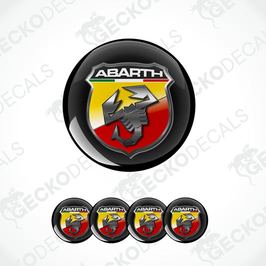 A set of circular Abarth decal stickers, featuring one large glossy emblem and four smaller identical emblems aligned at the bottom, all on a light gray background with faint watermarks.