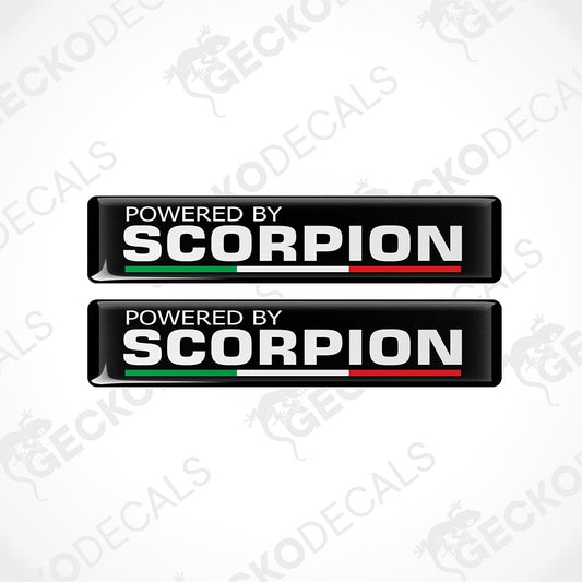 Two identical black rectangular decal stickers with the text 'POWERED BY SCORPION' in white, featuring a green and red stripe under 'SCORPION' on a light gray background with faint Geckodec watermarks.