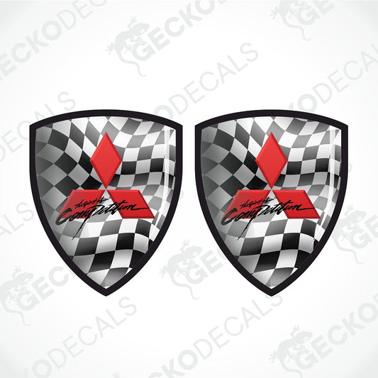 Two identical shield-shaped decals featuring a black and white checkered flag pattern, a red diamond, and the words 'Absolute Competition' in black script, shown on a light gray background with faint watermark text.