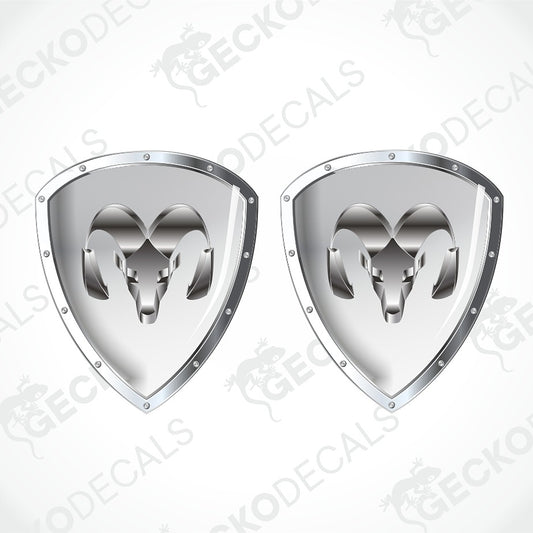 Two identical metallic silver shield-shaped decals with a ram head emblem in the center, shown on a light gray background with repeated watermark text.