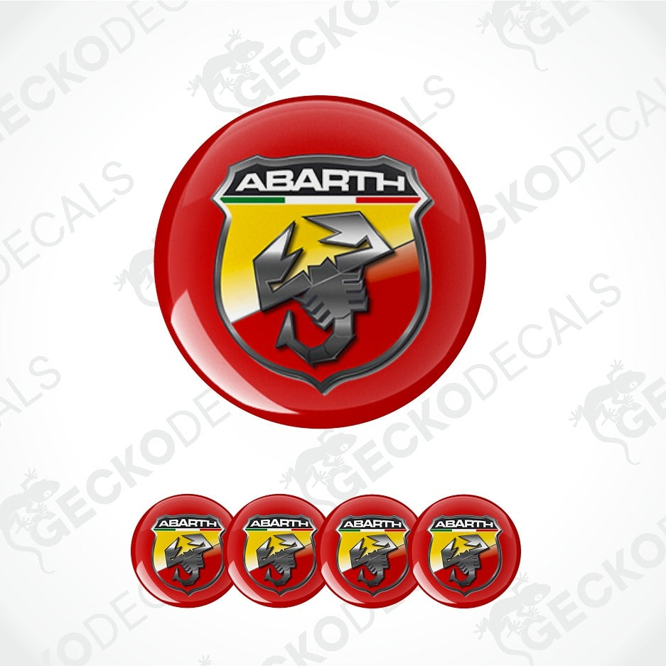 A set of circular Abarth decal stickers, featuring one large glossy red sticker with the Abarth logo and four smaller matching stickers lined up below, on a white background with diagonal watermarks.