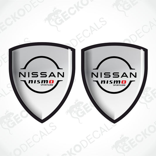 Two identical Nissan Nismo Sportline shield-shaped decals on a light gray background with diagonal watermark text.