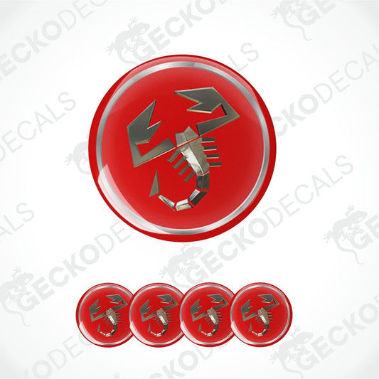 A set of circular red button-style decals featuring a metallic silver scorpion symbol, with one large decal and four smaller ones arranged on a white background. Faint repeated 'GECKODECALS' watermark text is visible across the image.