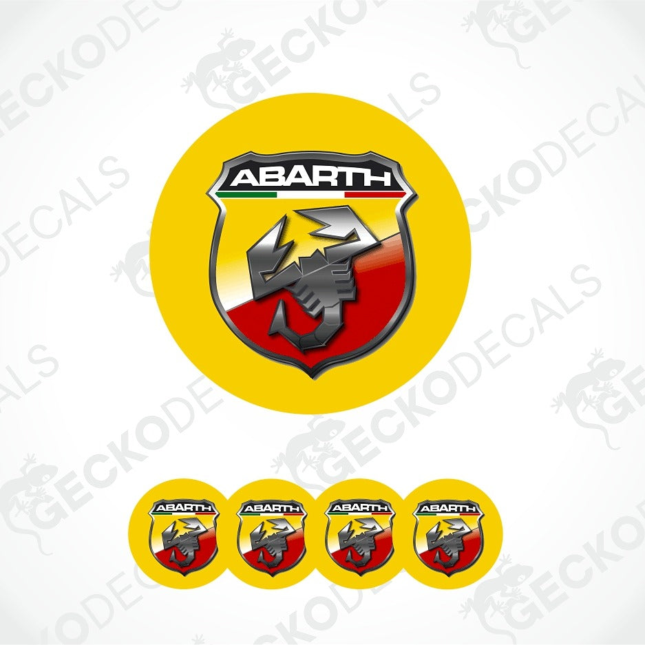 A set of Abarth decal stickers, featuring one large circular decal and four smaller oval decal stickers along the bottom, all displaying the Abarth logo on a yellow background.