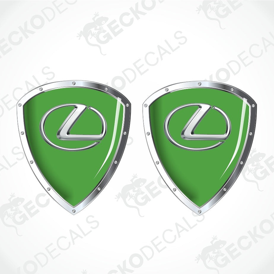 Two green Lexus shield-shaped decals with silver metallic borders and the Lexus logo in the center, shown on a white background with faint watermark text.