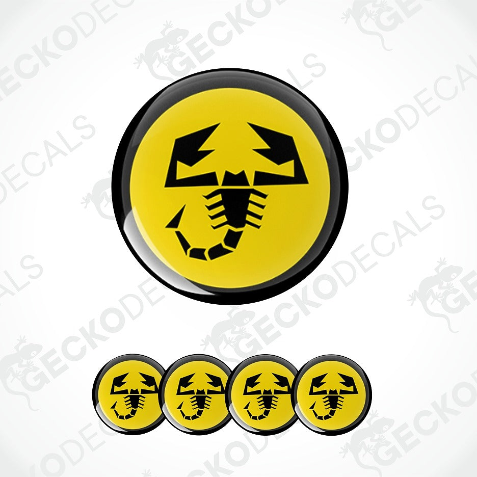 A set of circular yellow and black scorpion-themed decals, featuring one large decal above four smaller matching decals, displayed on a light gray background with diagonal watermarks.