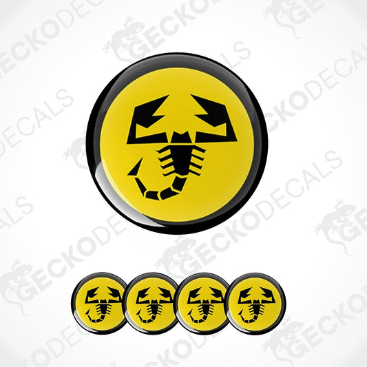 A set of circular yellow and black scorpion-themed decals, featuring one large decal above four smaller matching decals, displayed on a light gray background with diagonal watermarks.