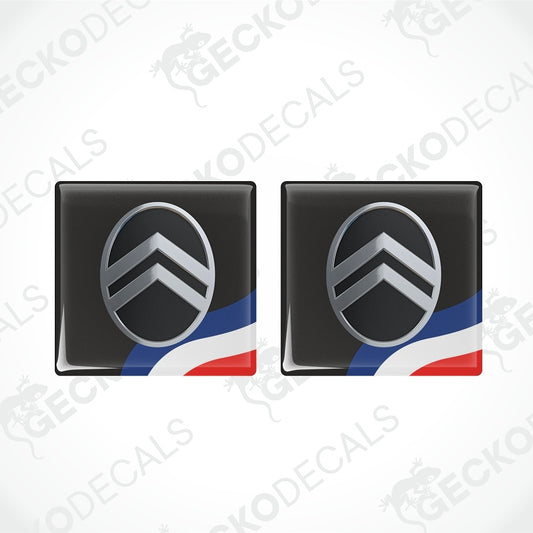Two black Citroøn door sill decals with the brand's chevron logo and white 'CITROËN' lettering, shown on a light gray background with a faint watermark pattern.