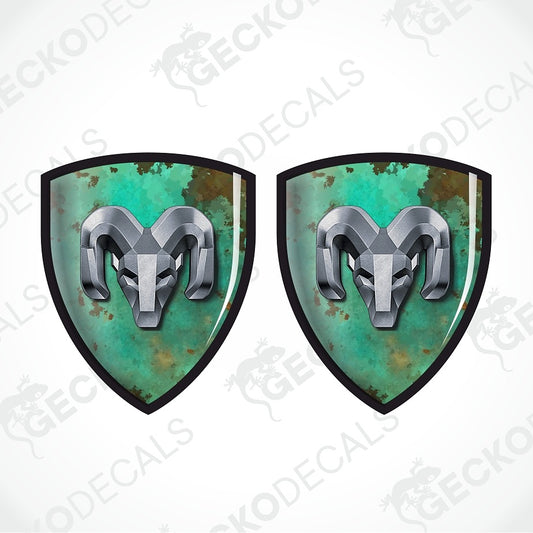 Two identical shield-shaped decals with a silver ram head logo over a distressed turquoise and green background, shown on a white background with a faint GECKODECALS watermark.