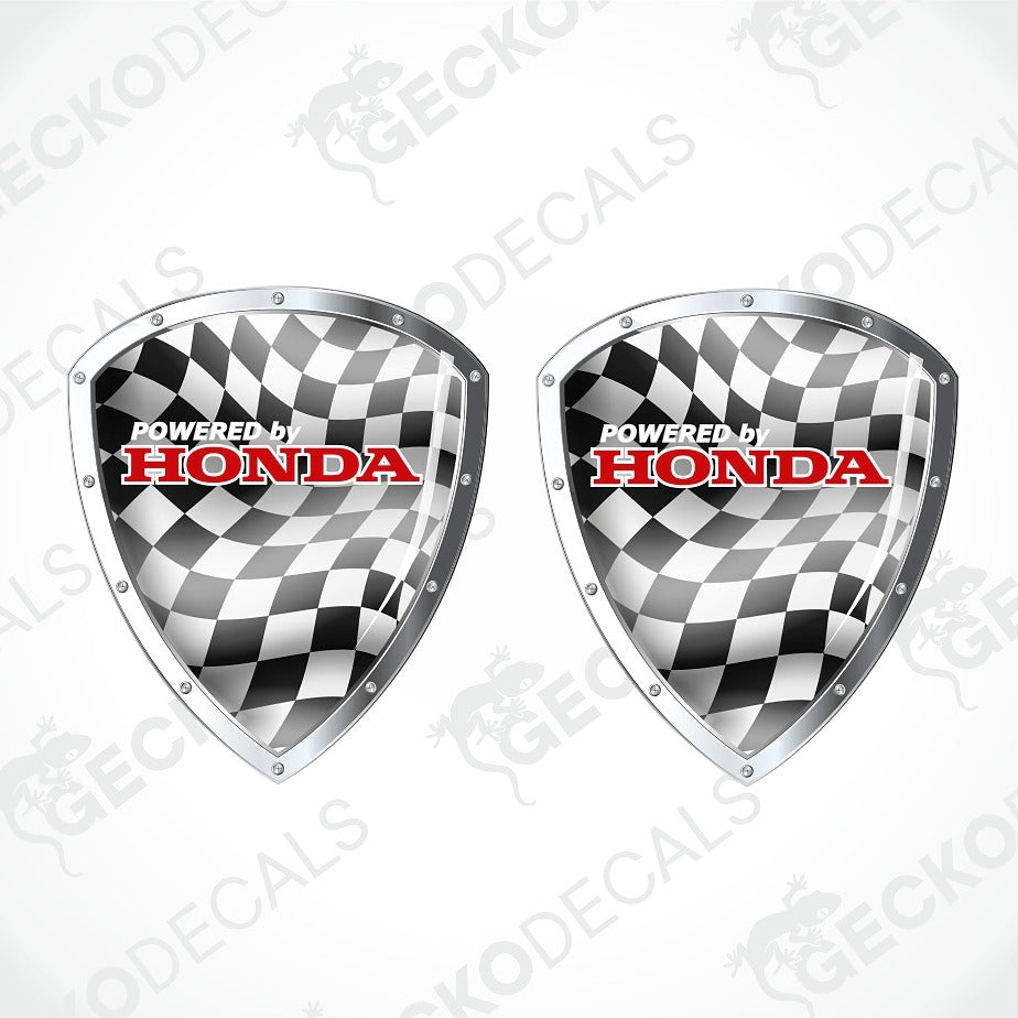 Two shield-shaped Honda decal stickers with a black and white checkered flag pattern and bold red 'HONDA' lettering, shown on a light gray background with diagonal watermarks.