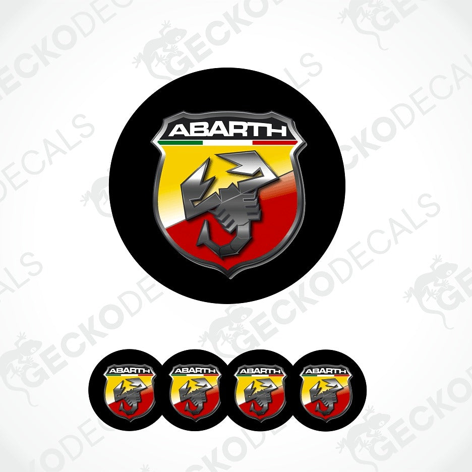 A set of circular Abarth decal stickers, featuring one large sticker and four smaller identical stickers aligned at the bottom. The decal features the Abarth logo with a black background, yellow and red shield, and a silver wolf head.