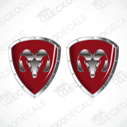 Two identical red and silver shield-shaped decals with a ram head emblem, shown on a light gray background with a faint diagonal watermark pattern.
