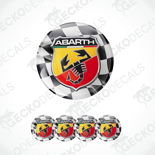 A set of round Abarth car decals featuring the Abarth logo, a yellow and red shield with a black hammer, and a black and white checkered border, shown with one large decal and four smaller ones on a white background with diagonal watermarks.