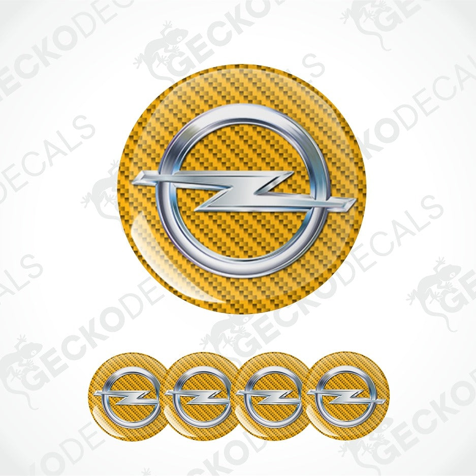 A set of circular car decals featuring the Opel logo on a yellow and black carbon fiber patterned background, with one large decal shown above four smaller ones on a white background with diagonal watermarks.