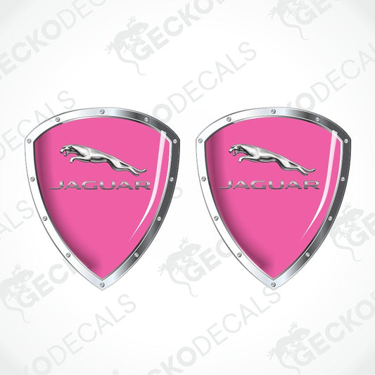 Two pink and silver Jaguar shield-shaped decals on a white background with diagonal watermarks.
