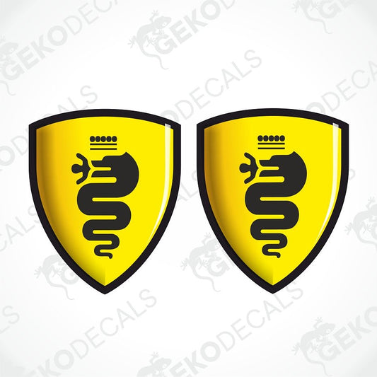 Two identical yellow shield-shaped decals with black borders and a black snake emblem, shown side by side on a white background with faint watermark text.