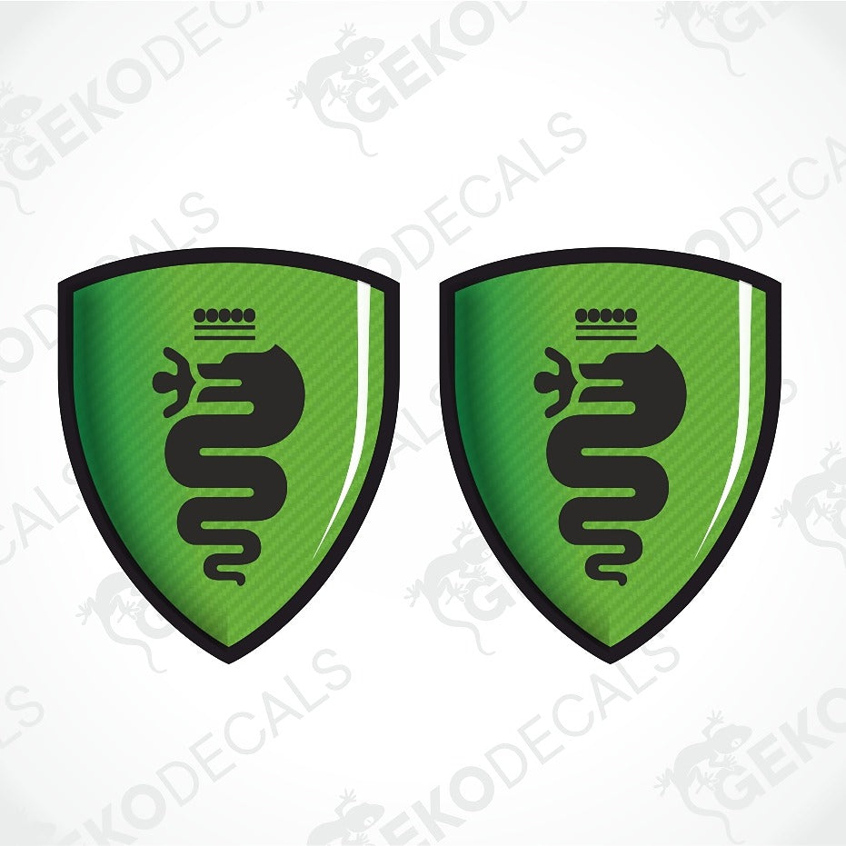 Two identical green shield-shaped decals with a black snake emblem and black border, shown on a white background with faint watermark text.