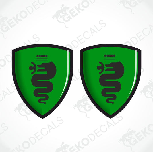 Two identical green shield-shaped decals with black borders and a black coiled snake emblem, shown side by side on a light gray background with faint GEKODECALS watermarks.