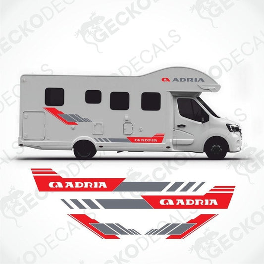 Red and gray ADRIA decorative stickers applied to white motorhome side showing fit and design