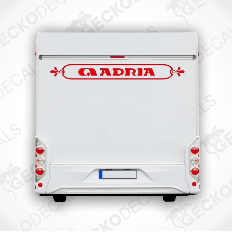 Red ADRIA caravan rear decal applied to white caravan back panel above license plate
