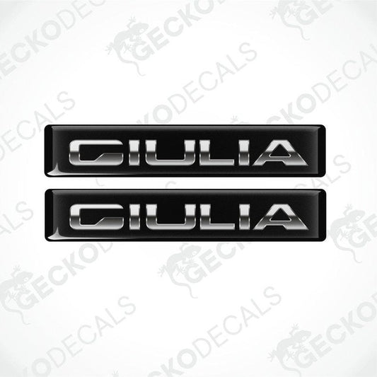 Two black and silver vinyl decals with the text 'GIULIA' on them, designed for use as car stickers.