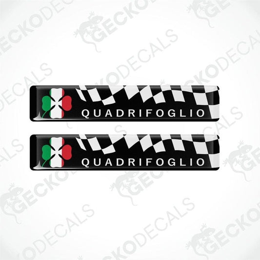 Two vinyl stickers with a checkered pattern and the word 'QUADRIFOGLIO' written on them, against a white background.