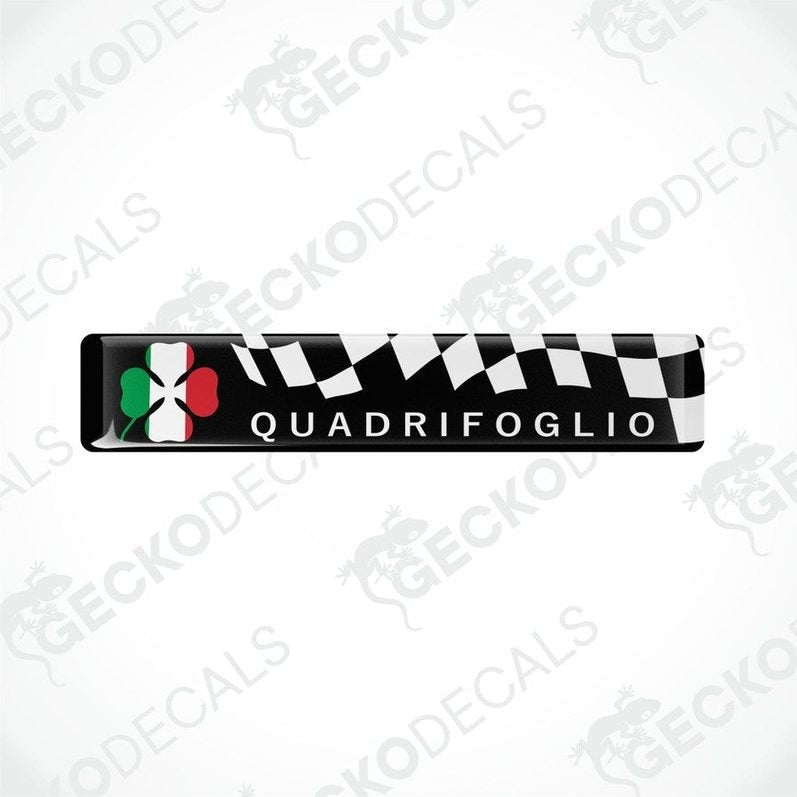 Vinyl stickers with a checkered pattern and the word 'QUADRIFOGLIO' written on them, against a white background.