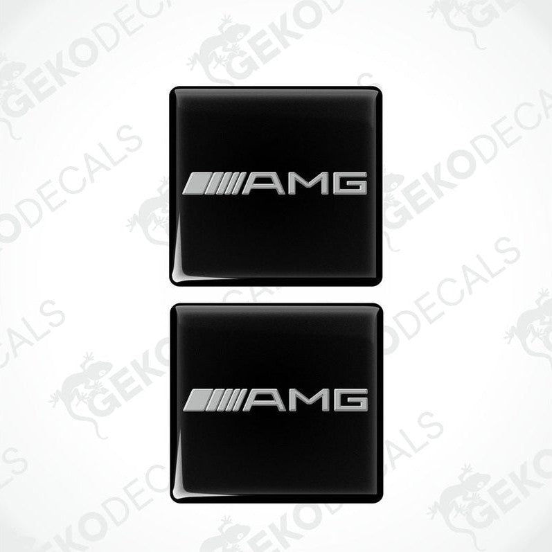 Two black vinyl stickers with the AMG logo, arranged one on top of the other.