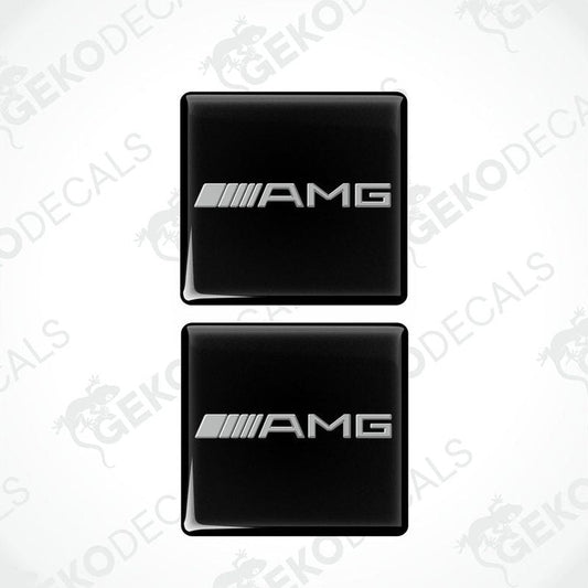 Two black vinyl stickers with the AMG logo, arranged one on top of the other.