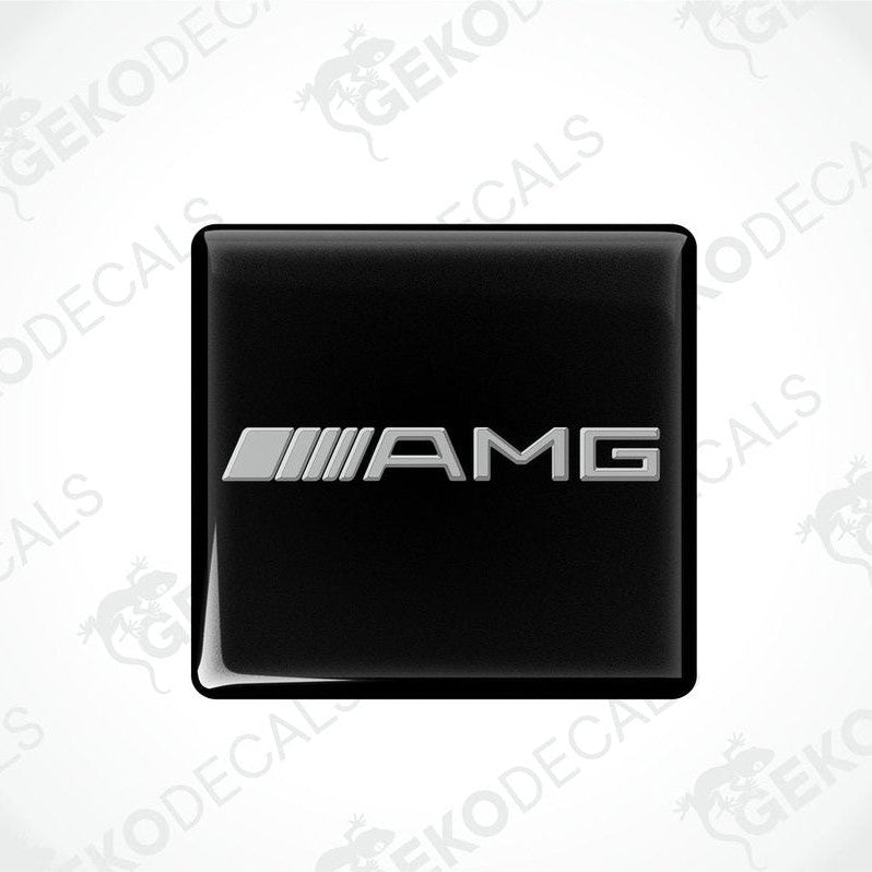 Two black vinyl stickers with the AMG logo, arranged one on top of the other.