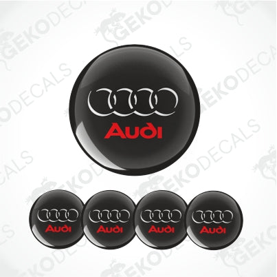 A set of four black vinyl stickers with a red and white Audi logo, displayed on a white background.