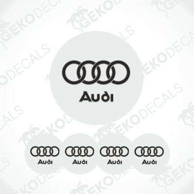 Audi rings in black with Audi written in a white circle underneath, with a GeckoDeckals watermarked background