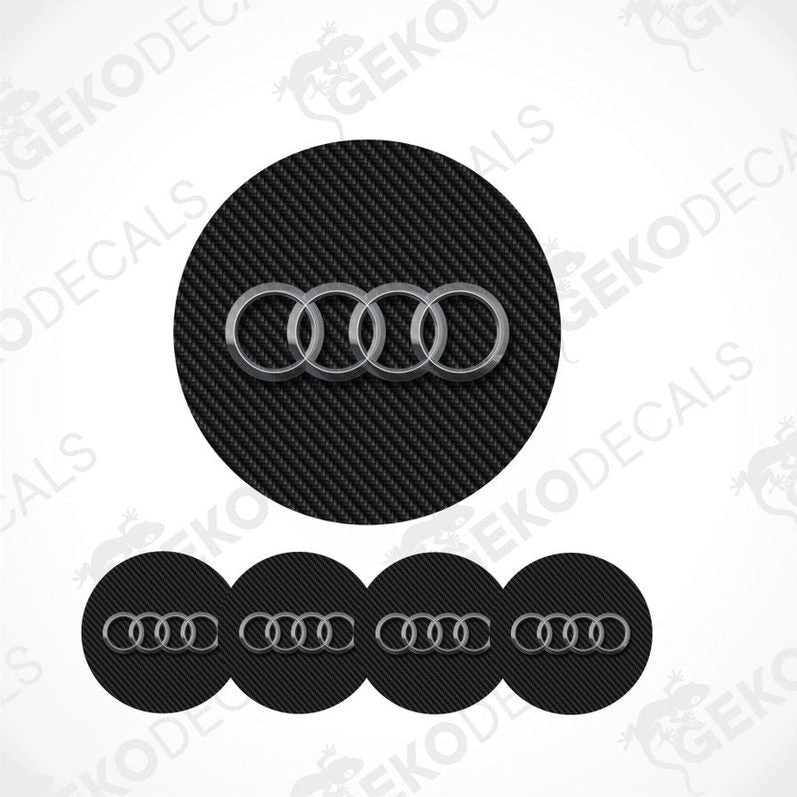 Black and yellow 'e-tron' logo with multiple instances on a white background.
