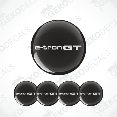 Set of four black round car epoxy decals with 'e-tron GT' text, displayed on a white background.
