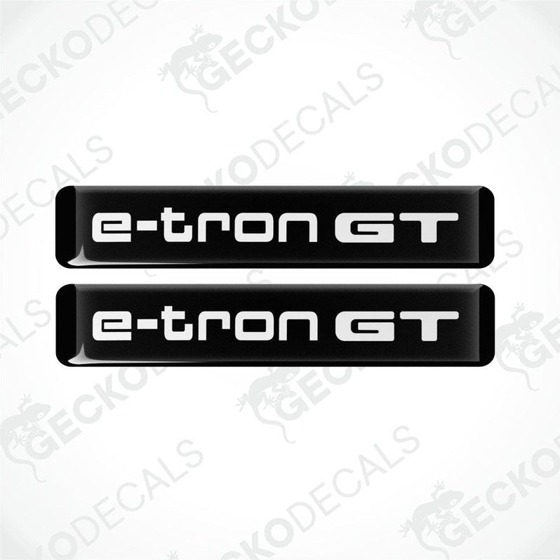 Two black decals with 'e-tron GT' written in white, designed for car use.