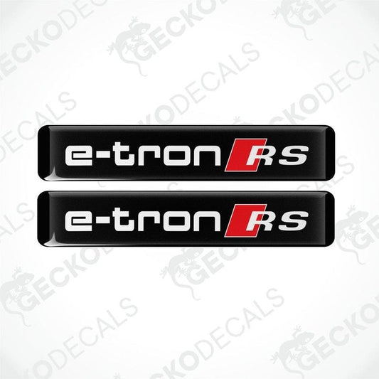 Two black, red, and white vinyl decals with the text 'e-tron RS' on them, placed on a white background.