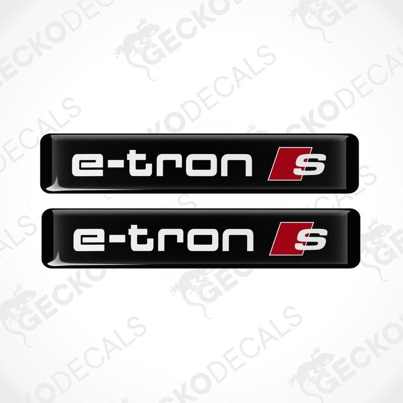 Two black stickers with white text E-TRON and red Audi S-line logo