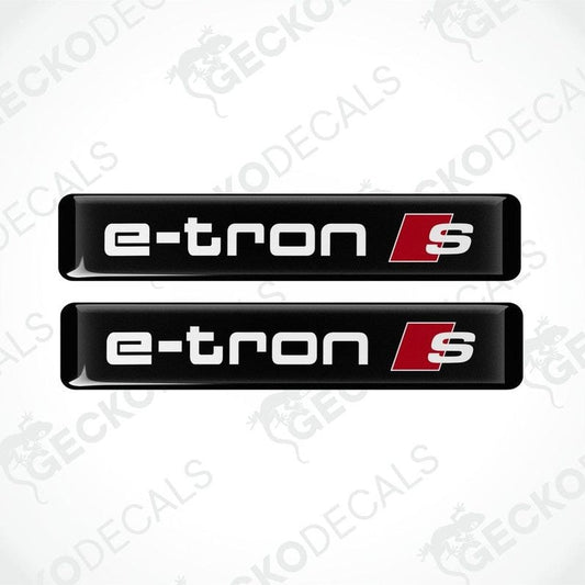 Two black stickers with white text E-TRON and red Audi S-line logo
