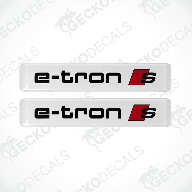 Two white stickers with black text E-TRON and red Audi S-line logo